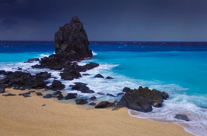 A powerful typhoon advances slowly toward the quiet and remote gold sand beaches of Apo Island off the coast of Dumaguete, Philippines...