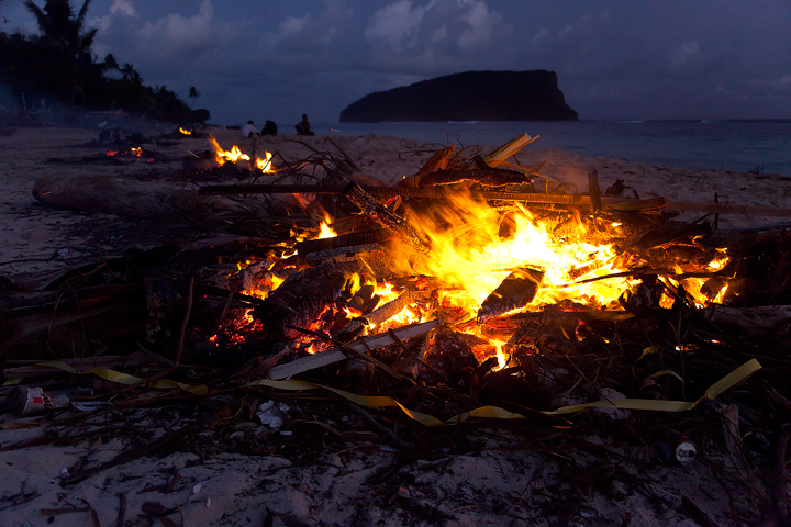 The Burning Ruins of Lalomanu Beach Paradise Lost. What was left of the Taufua Beach Fales was collected into piles and burned on the beach. There is no heavy equipment...