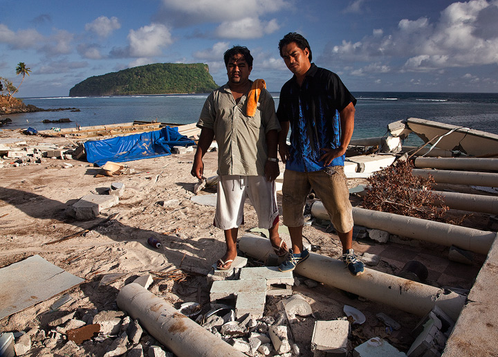 Defiance at Lalomanu Standing over the ruins of the beachside restaurant at Litia Sini's Beach Fales, these men recall the horrifying moment the 25...