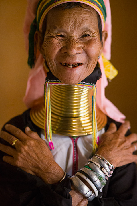 A woman of the Kayan tribe in Myanmar.&nbsp; These women begin wearing the rings at age 5.&nbsp; As they get older more rings...