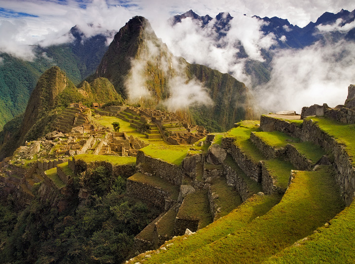 Storm clouds clear shortly after sunrise, revealing the dramatic splendor of the ancient ruins of the lost city of the Inca.&...