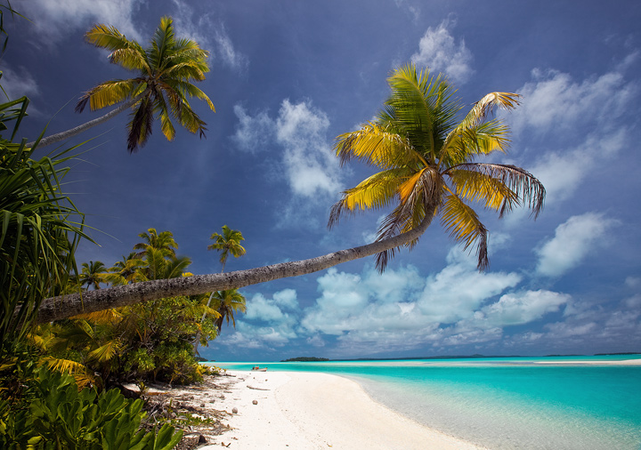 The spectacular white sand beaches and turquise lagoons of Aitutaki, Cook Islands.