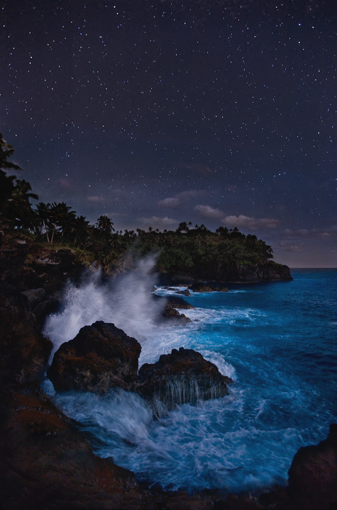 Pacific Midnight A sky filled with stars and the half light of the moon make for an enchanted night on the lost coast of Tutuila. American...