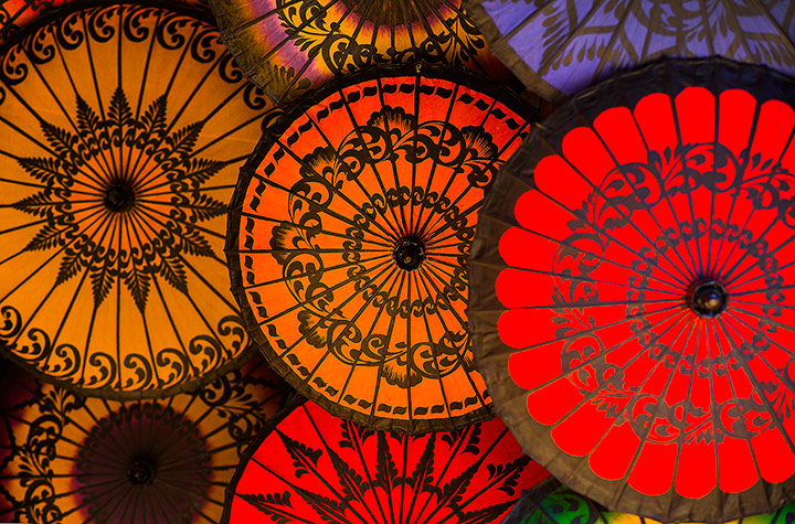 The Colors of Burma Backlit Parasols for sale by a local street vendor in Bagan.