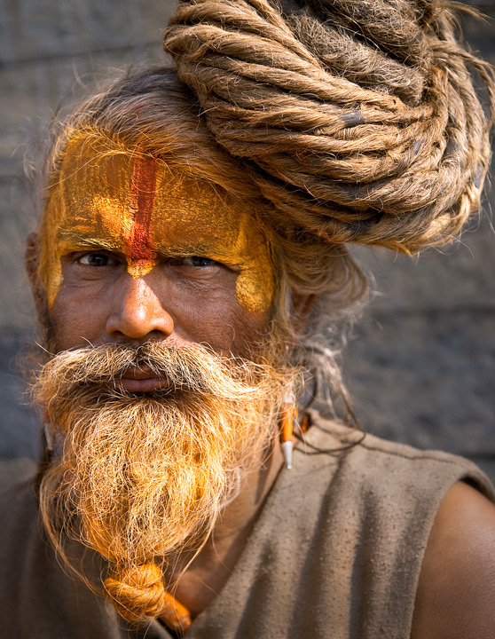 Intense devotion in the eyes of a hindu pilgrim.  Pashputinath temple, Kathmandu, Nepal.