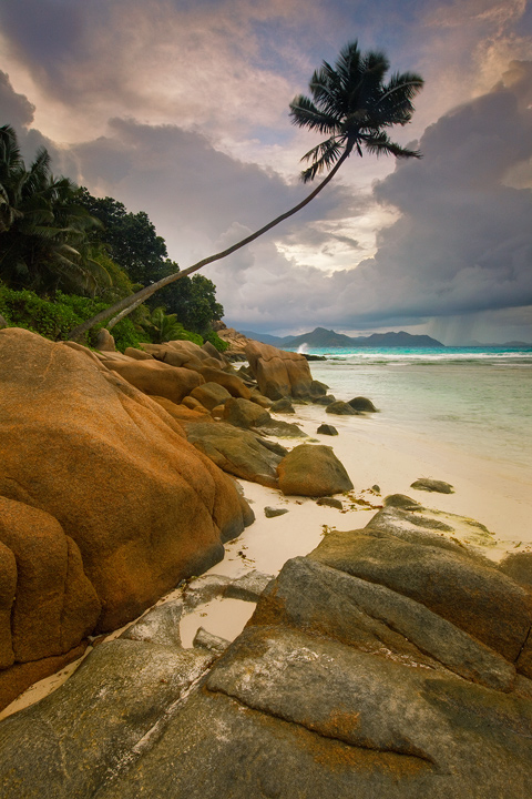 A stormy sunset over Anse Severe beach, La Digue Island, Seychelles.