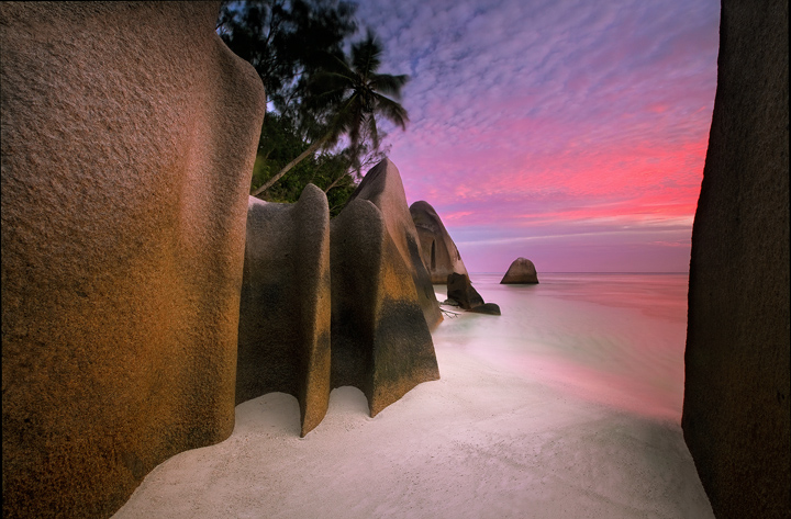 Emptiness at sunset on one of the most spectacular beaches in the world.  The Seychelles Islands off the East coast of Africa...