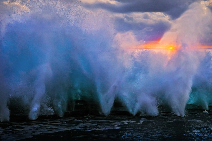 Sunset among the amazing Mapu'a Vaca coast blowholes.